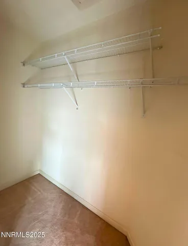 a view of a room with racks on the wall