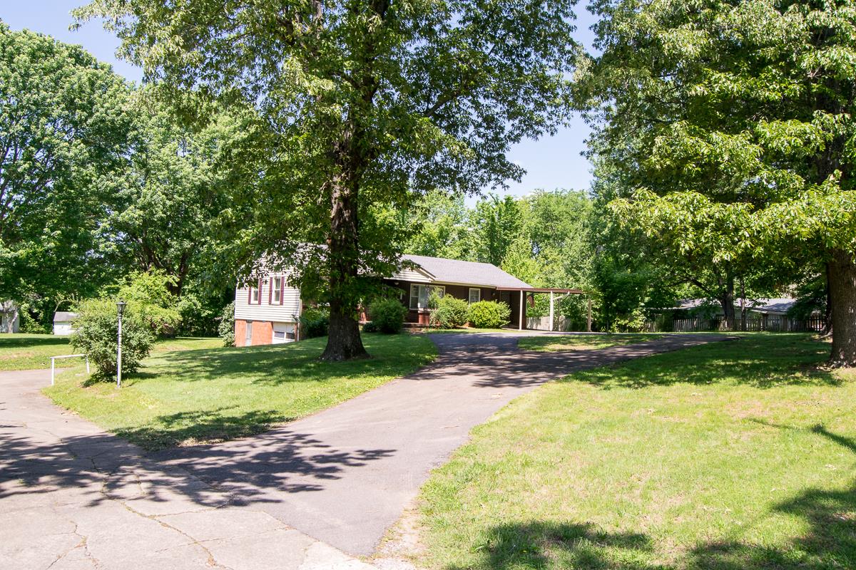 160 Excell Road Clarksville, TN 37043 - Photo 1 of 30 a front view of a house with garden