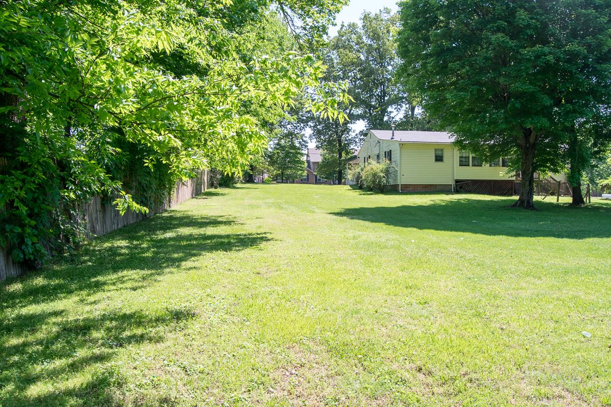 160 Excell Road Clarksville, TN 37043 - Photo 25 of 30 a house view with a big yard and large trees