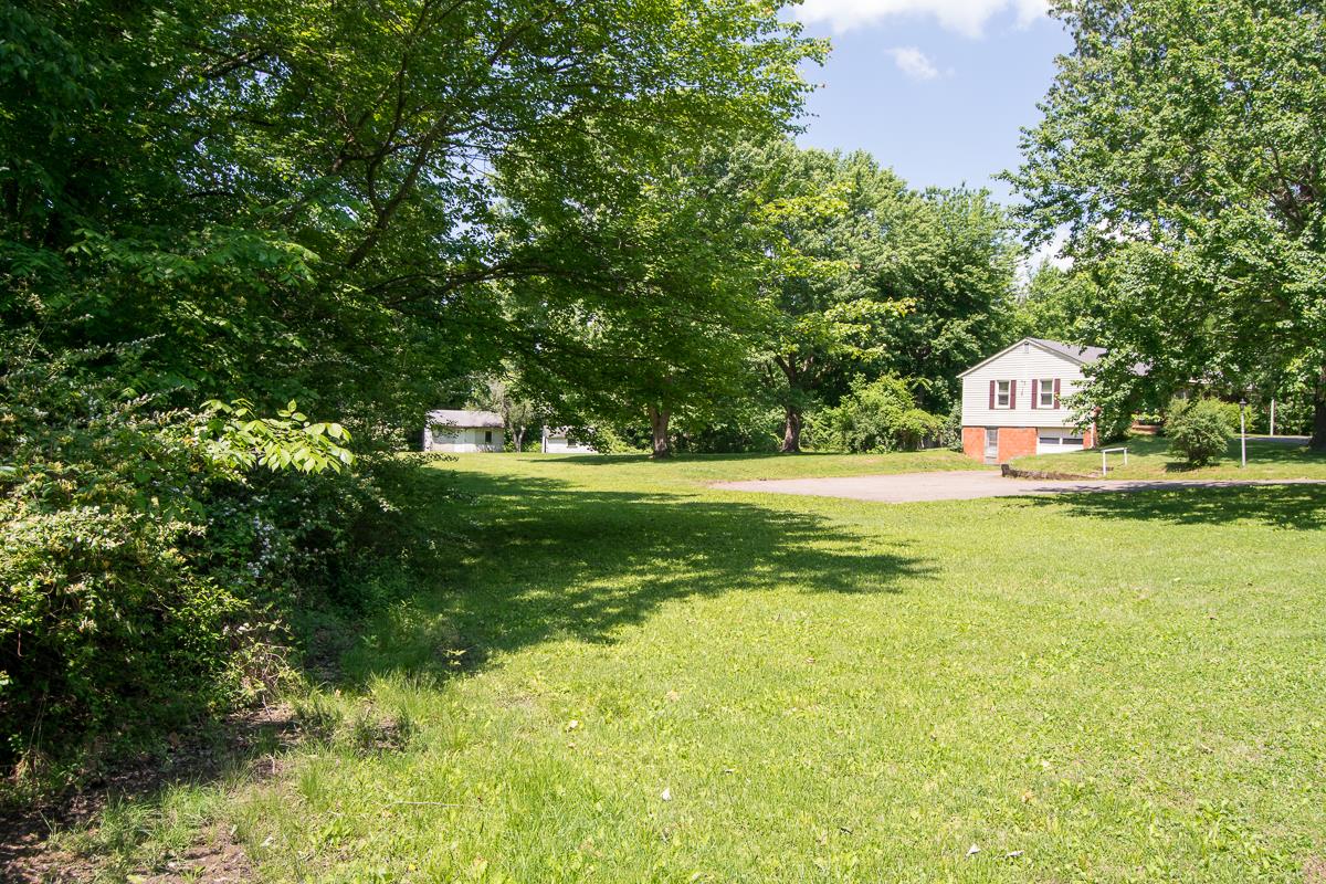 160 Excell Road Clarksville, TN 37043 - Photo 30 of 30 a view of a house with a big yard and large trees