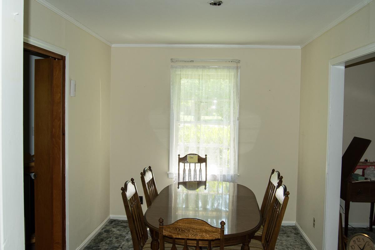 160 Excell Road Clarksville, TN 37043 - Photo 5 of 30 a view of a dining room with furniture and wooden floor