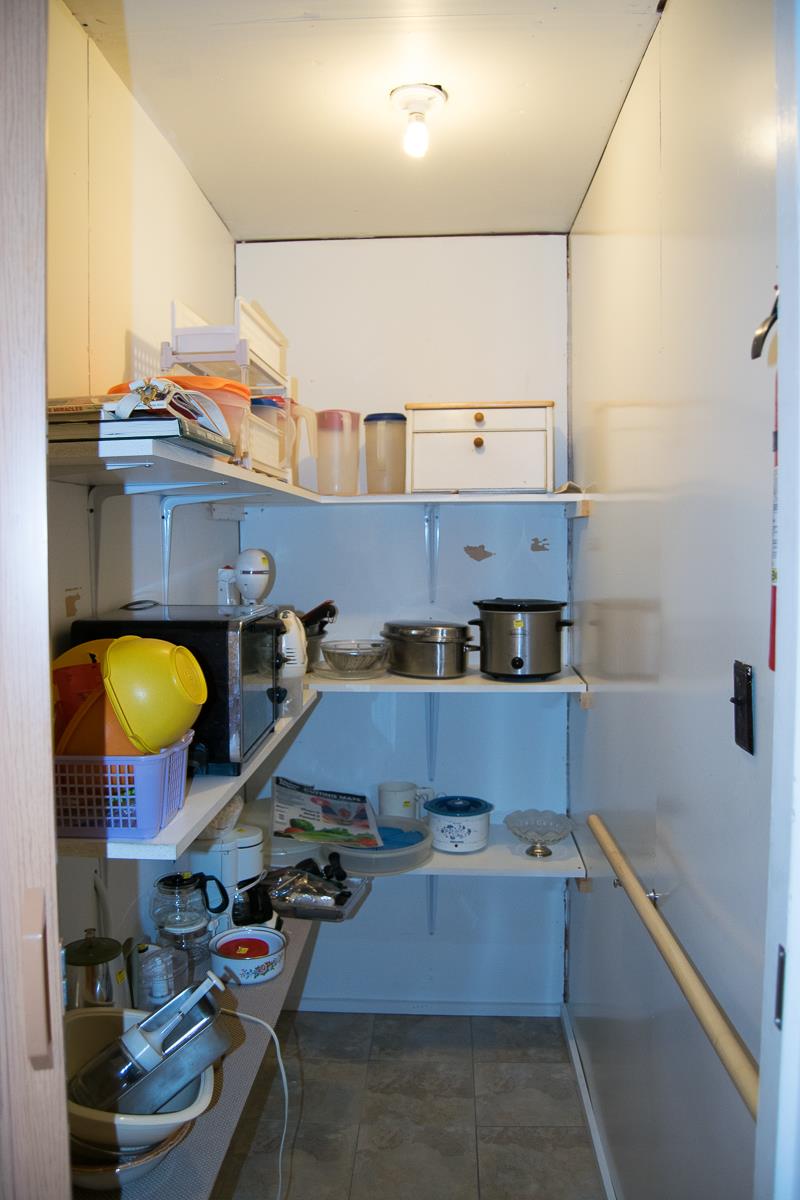 160 Excell Road Clarksville, TN 37043 - Photo 7 of 30 a room with a stove and a refrigerator