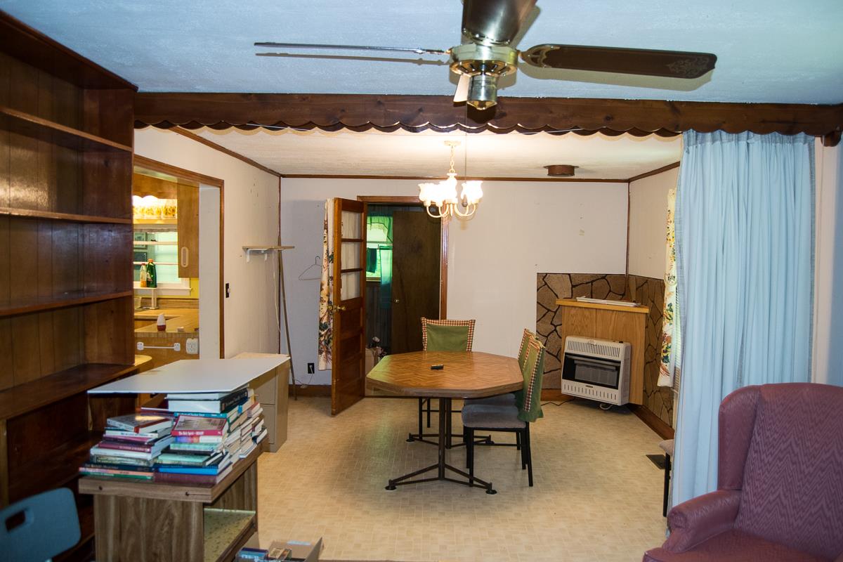 160 Excell Road Clarksville, TN 37043 - Photo 9 of 30 a living room with furniture and a flat screen tv