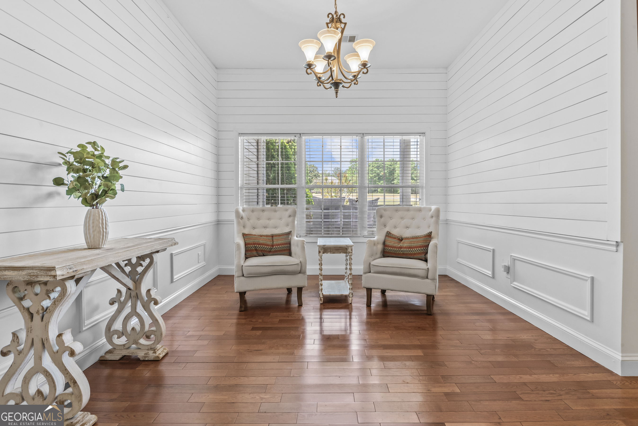 180 Cooper Road Social Circle, GA 30025 - Photo 20 of 51 a living room with furniture and a wooden floor