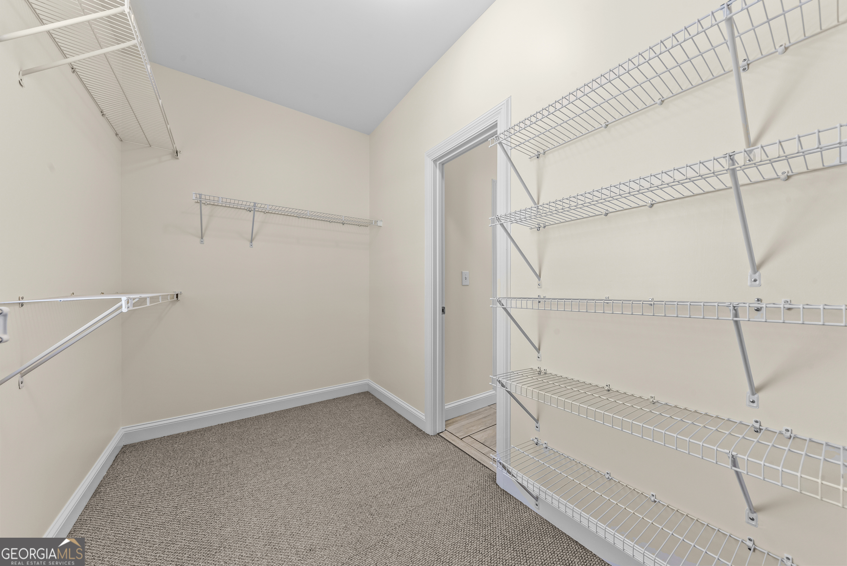 180 Cooper Road Social Circle, GA 30025 - Photo 35 of 51 a view of a room with racks on the wall