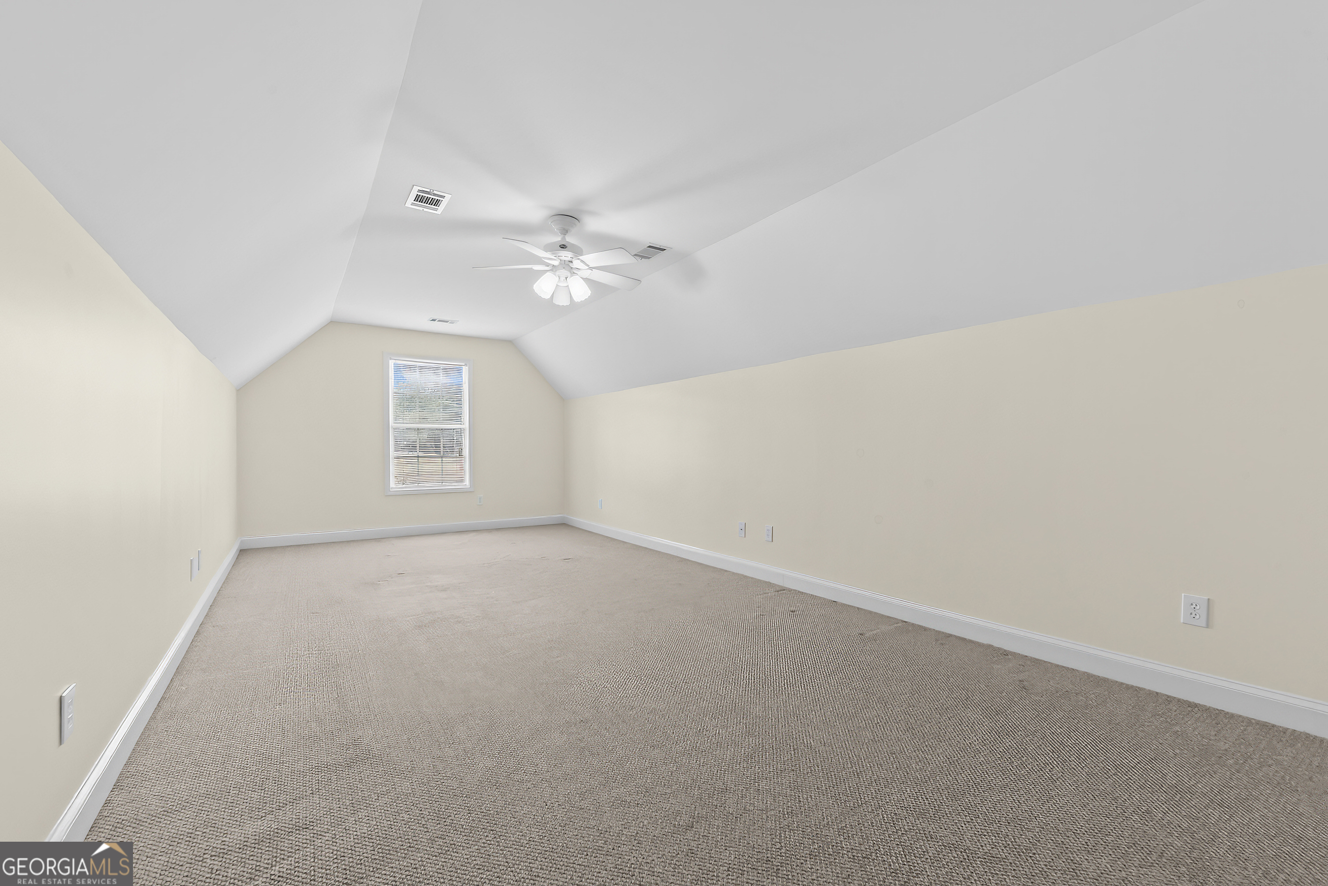 180 Cooper Road Social Circle, GA 30025 - Photo 37 of 51 an empty room with windows and fan