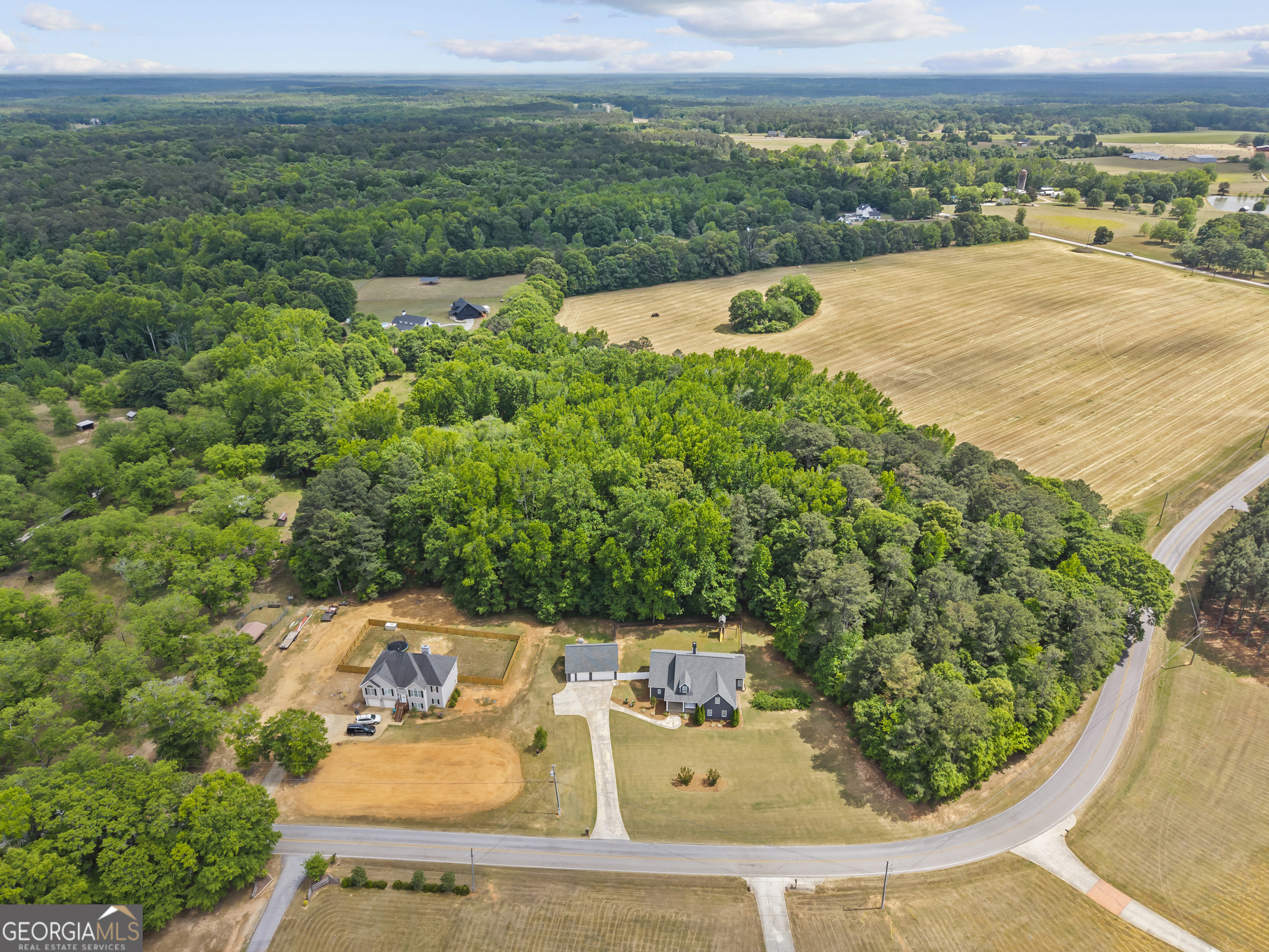 180 Cooper Road Social Circle, GA 30025 - Photo 4 of 51 an aerial view of a house with yard