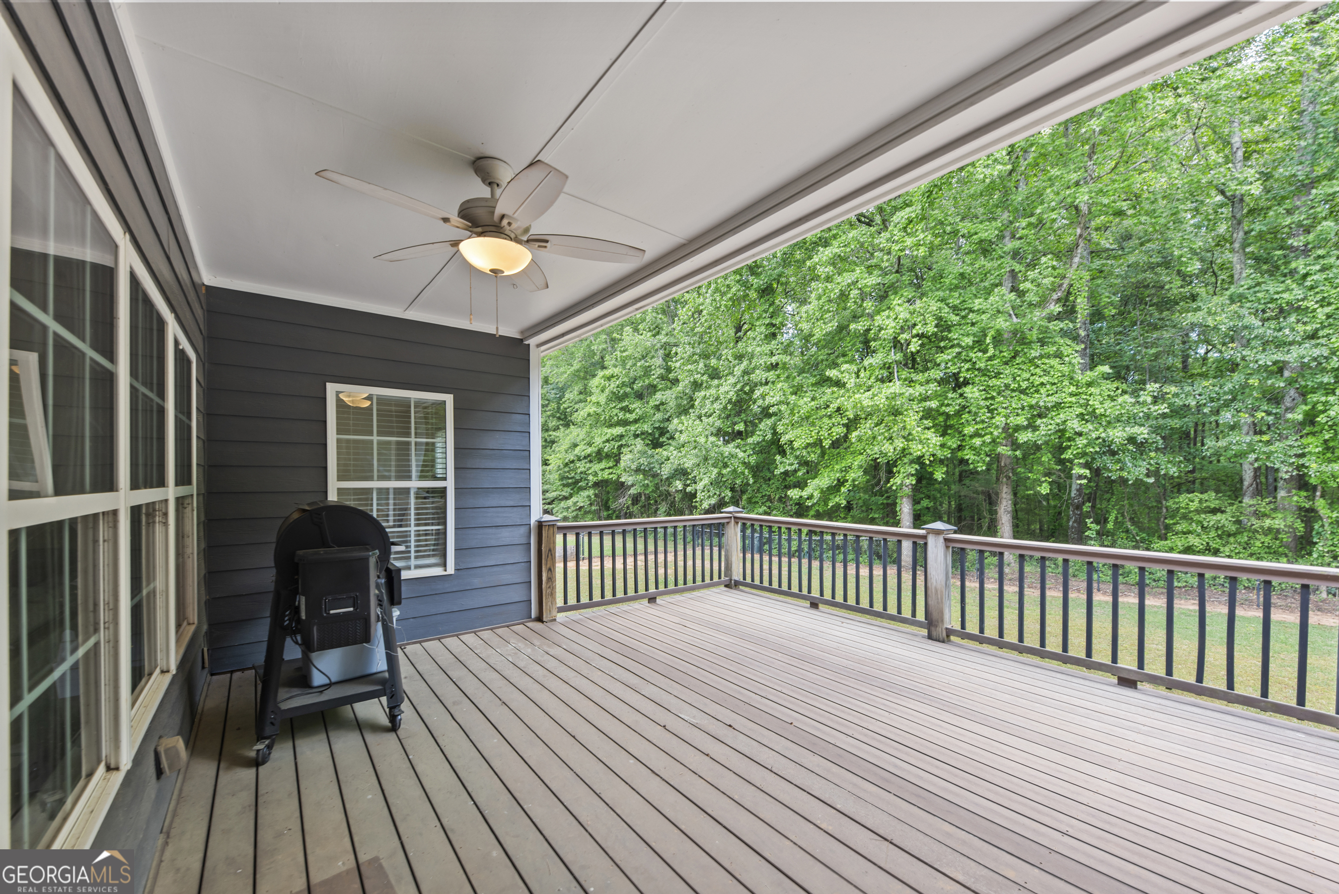 180 Cooper Road Social Circle, GA 30025 - Photo 46 of 51 a house view with a seating space