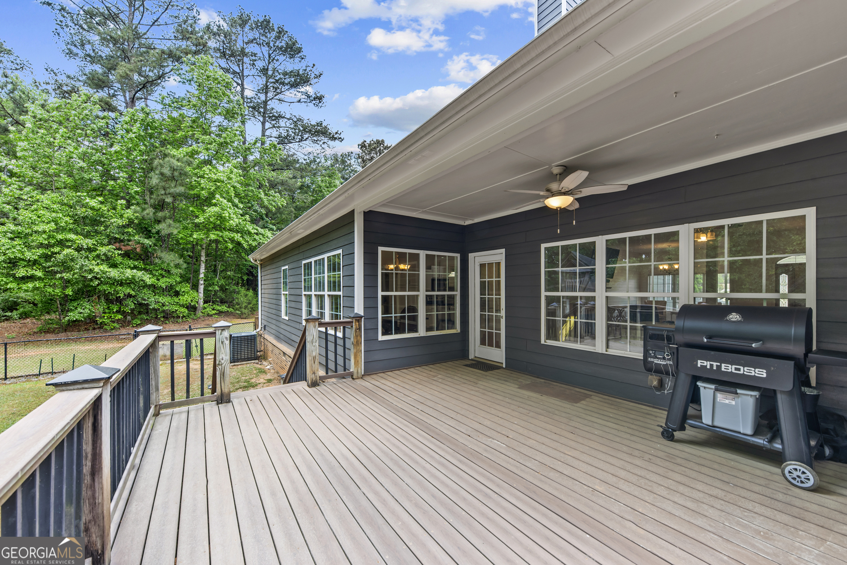 180 Cooper Road Social Circle, GA 30025 - Photo 47 of 51 a view of a house with backyard and deck