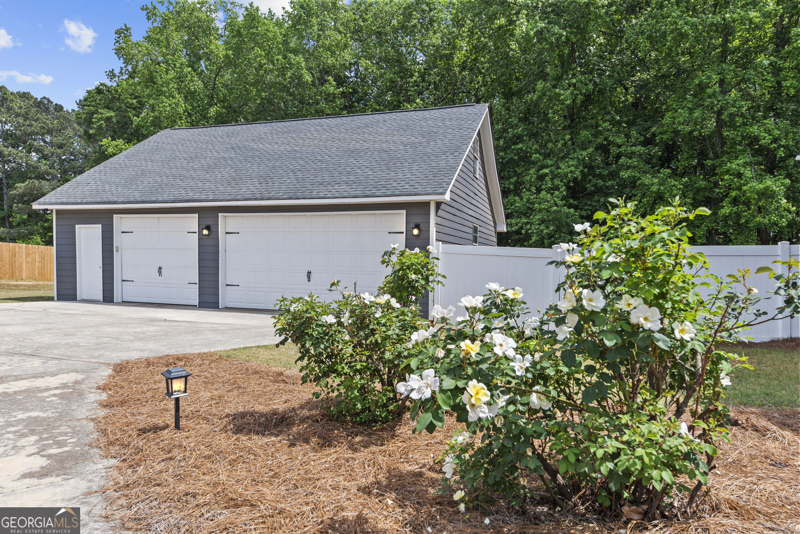 180 Cooper Road Social Circle, GA 30025 - Photo 49 of 51 a house with a yard