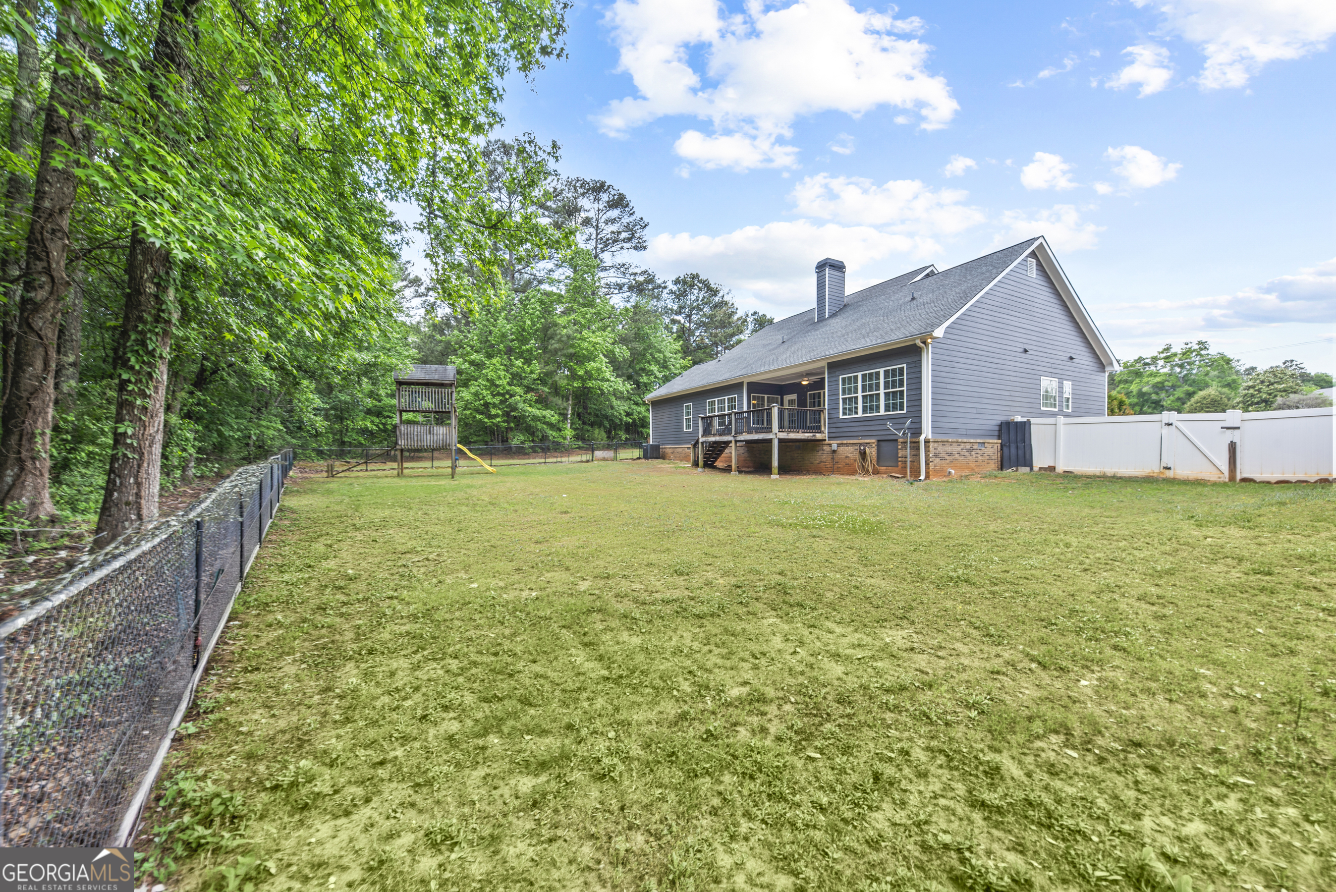 180 Cooper Road Social Circle, GA 30025 - Photo 51 of 51 a house view with a garden space