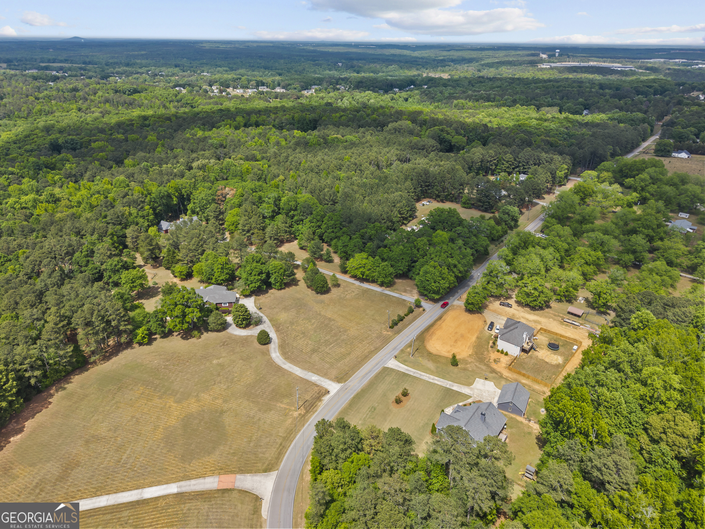 180 Cooper Road Social Circle, GA 30025 - Photo 6 of 51 an aerial view of a house with a yard