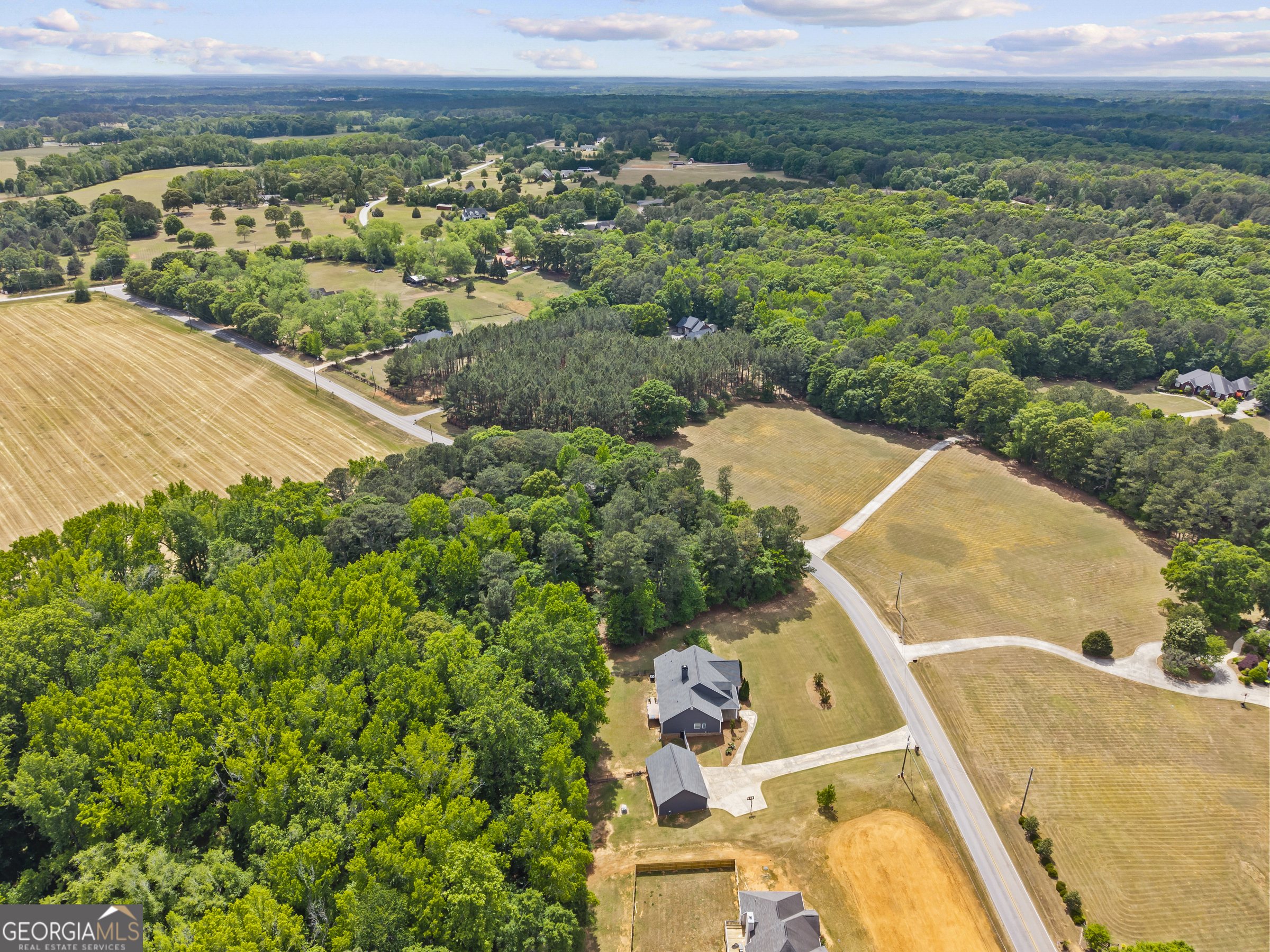 180 Cooper Road Social Circle, GA 30025 - Photo 7 of 51 an aerial view of a house with a yard