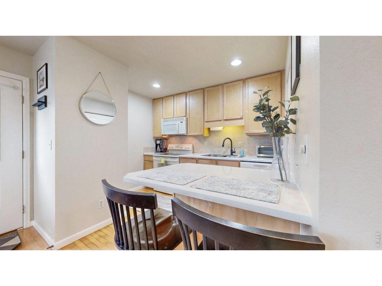 1601 West Swallow Road, Unit 8B Fort Collins, CO 80526 - Photo 9 of 32 Kitchen Island