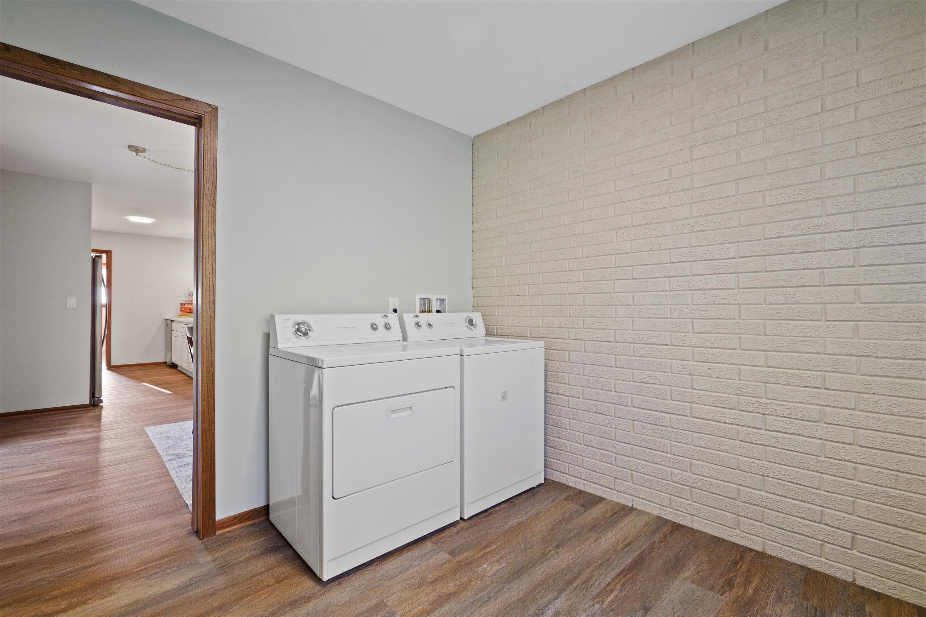 726 Royal Park Road Caledonia, WI 53402 - Photo 8 of 29 Main level laundry adds everyday convenience, keeping essential tasks easily accessible