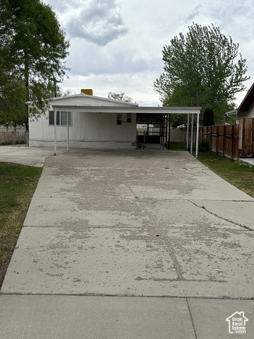 650 South 100 East Price, UT 84501 - Photo 1 of 1 View of front of house with a carport
