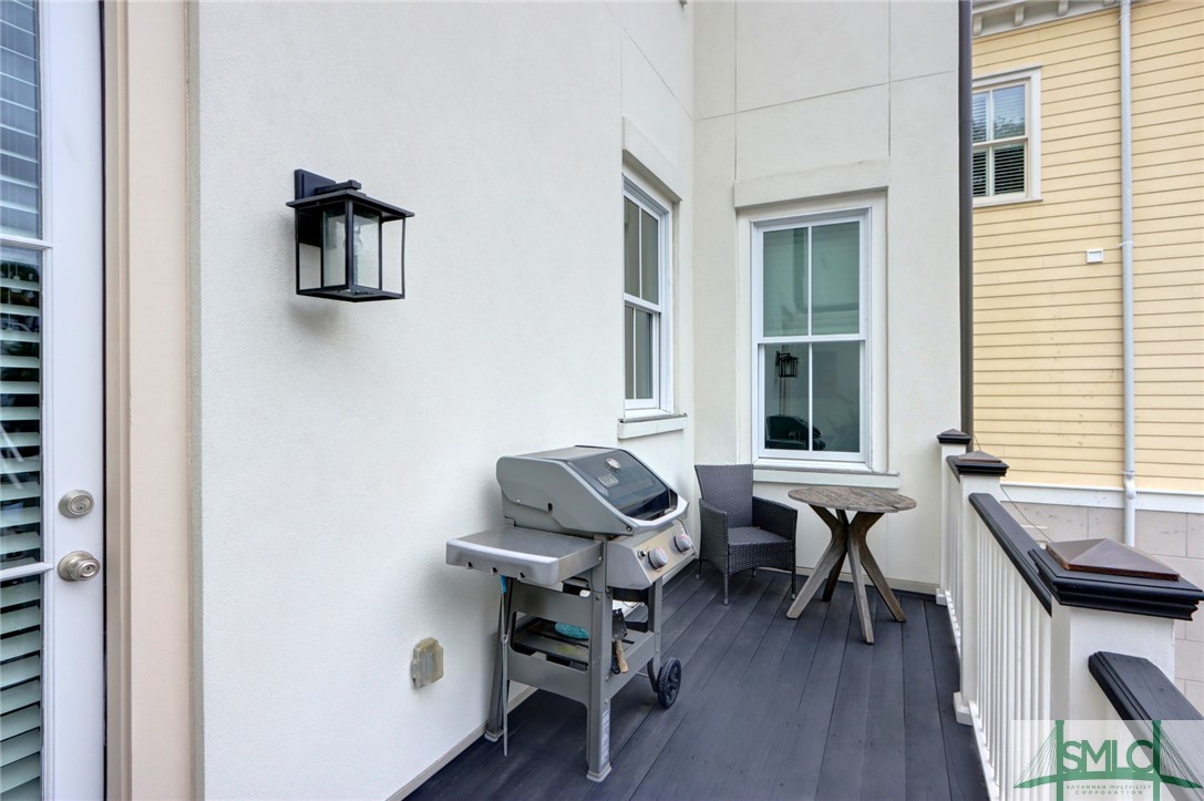 705 Howard Street Savannah, GA 31401 - Photo 17 of 46 Convenient balcony off kitchen perfect for the gri