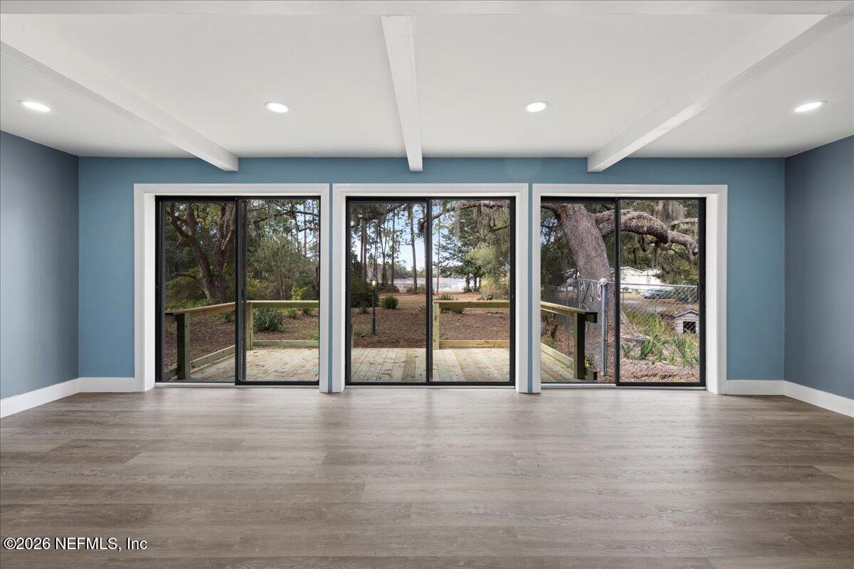 242 Taylor Fury Road Pomona Park, FL 32181 - Photo 22 of 40 a view of an entryway with wooden floor