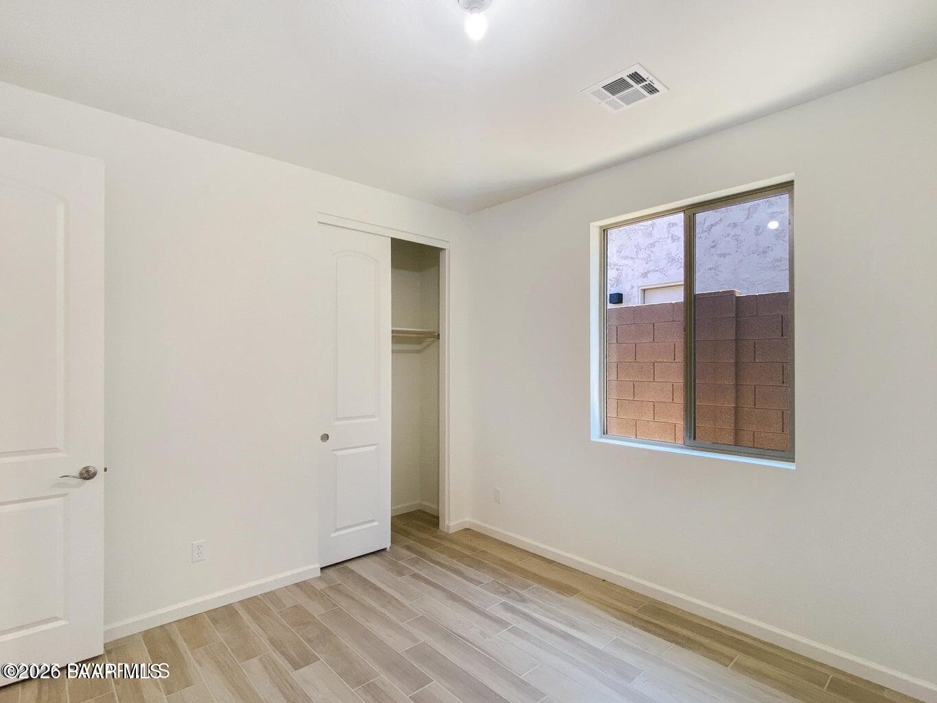 832 Eugene Road Clarkdale, AZ 86324 - Photo 14 of 30 an empty room with windows