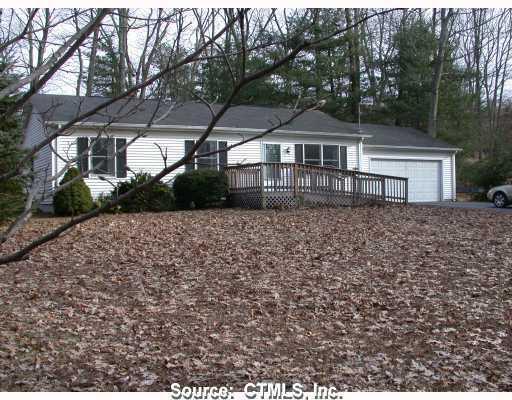 204 Wauregan Road Killingly, CT 06239 - Photo 1 of 1 front view of a house with a yard