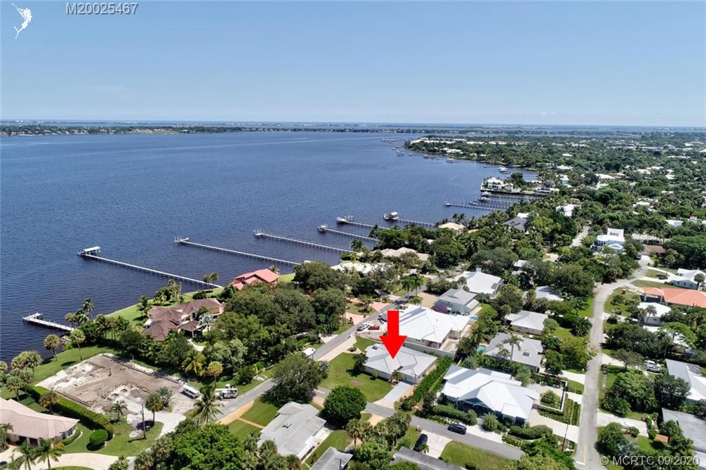 904 Southeast Riverside Drive Stuart, FL 34994 - Photo 60 of 72 an aerial view of a city