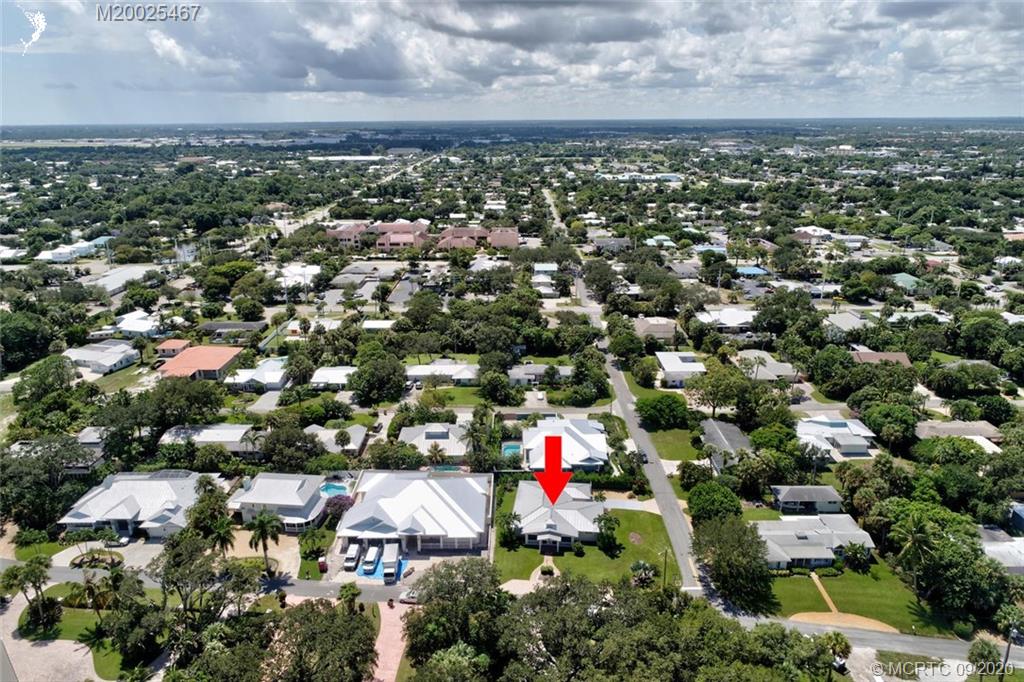 904 Southeast Riverside Drive Stuart, FL 34994 - Photo 64 of 72 an aerial view of multiple house