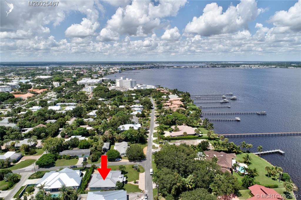 904 Southeast Riverside Drive Stuart, FL 34994 - Photo 66 of 72 an aerial view of house with yard and ocean view