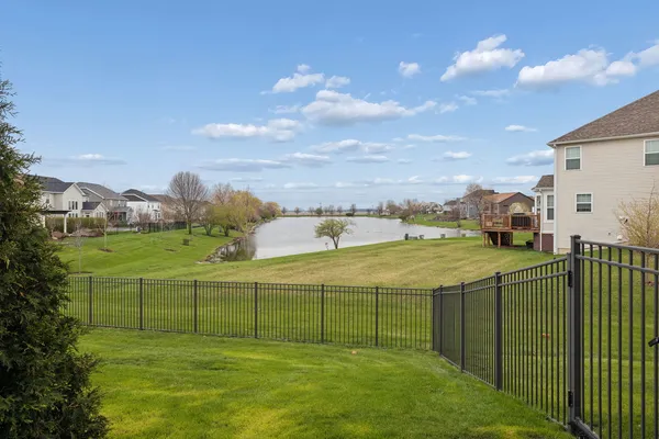 an aerial view of a house with outdoor space