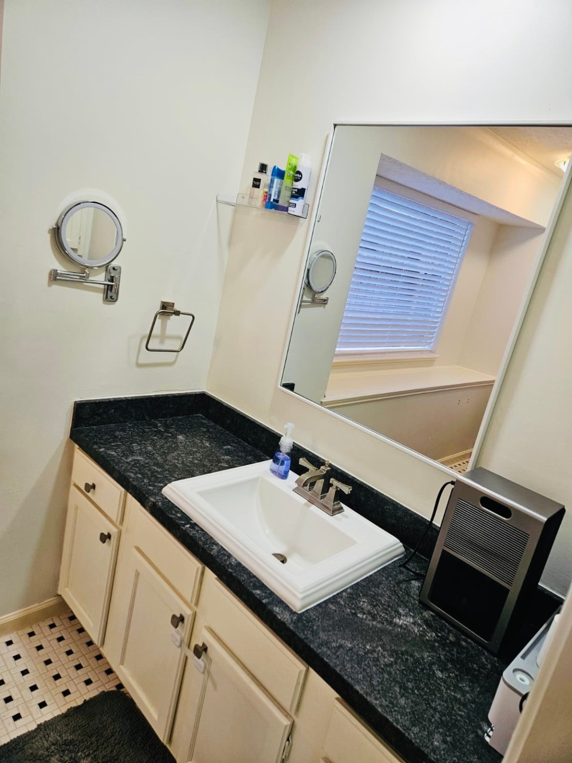 5211 Rivertree Lane Spring, TX 77379 - Photo 14 of 20 a bathroom with a sink and a mirror