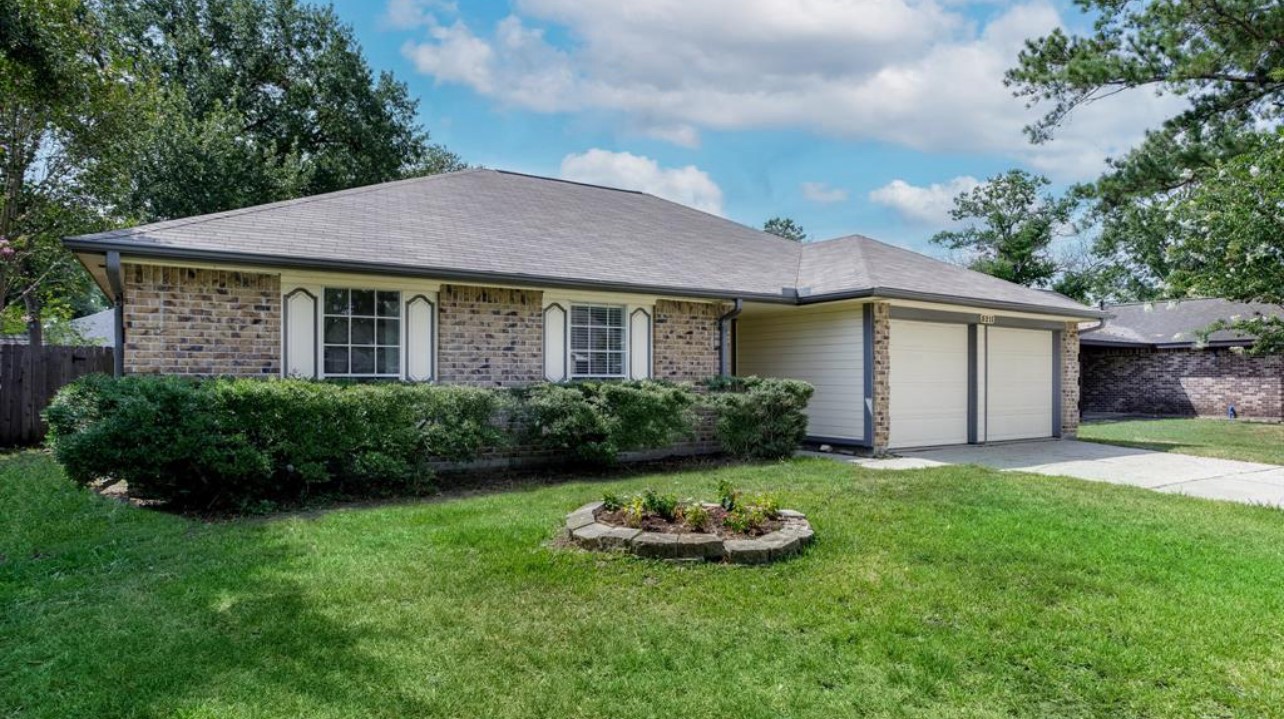 5211 Rivertree Lane Spring, TX 77379 - Photo 2 of 20 a view of a house with garden and yard