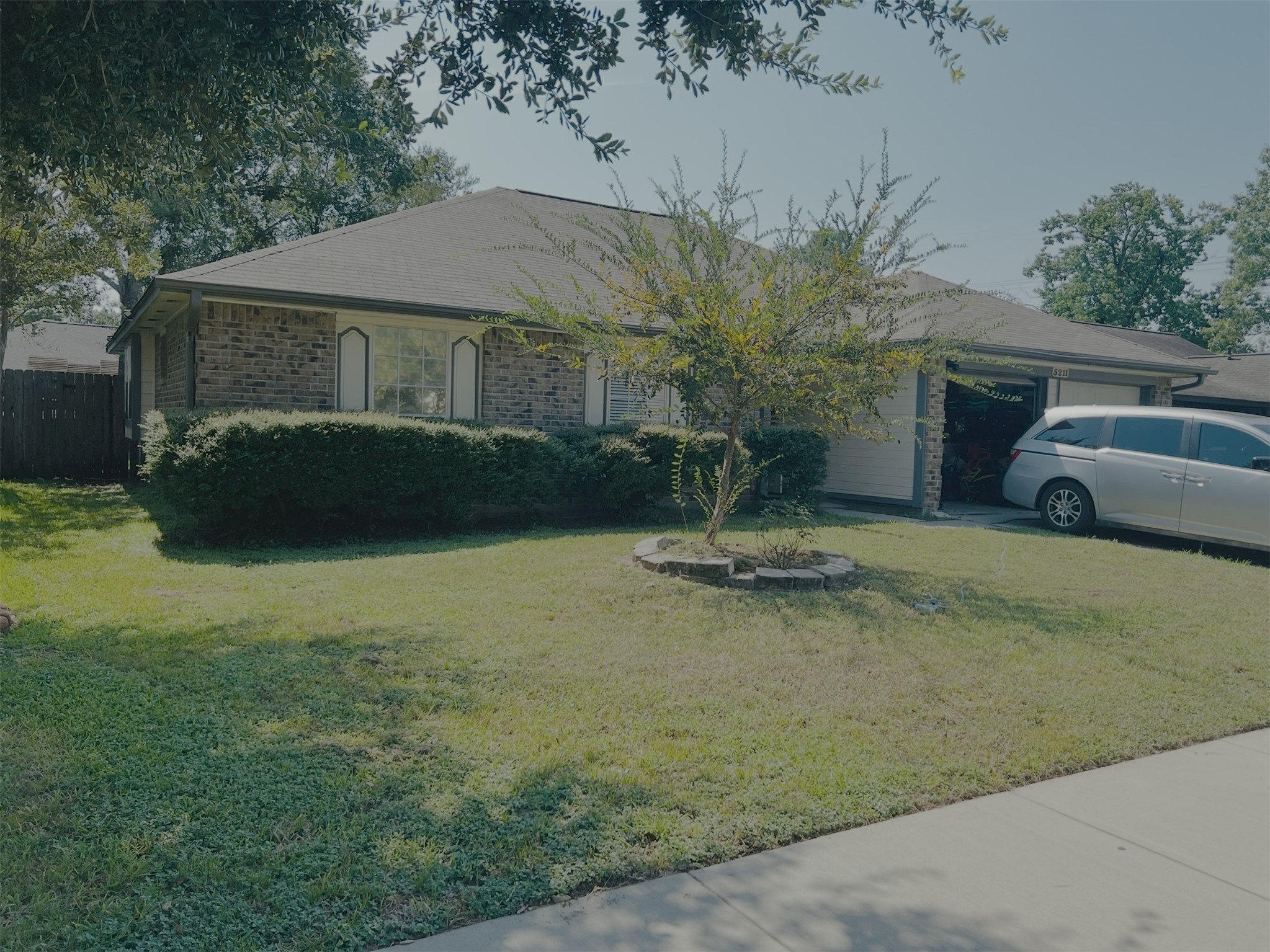 5211 Rivertree Lane Spring, TX 77379 - Photo 3 of 20 a front view of a house with a garden