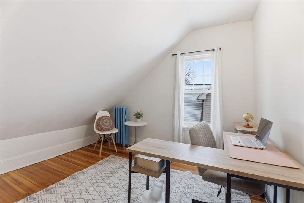 141 Lincoln Road Longmeadow, MA 01106 - Photo 15 of 26 a reading room with furniture and a wooden floor