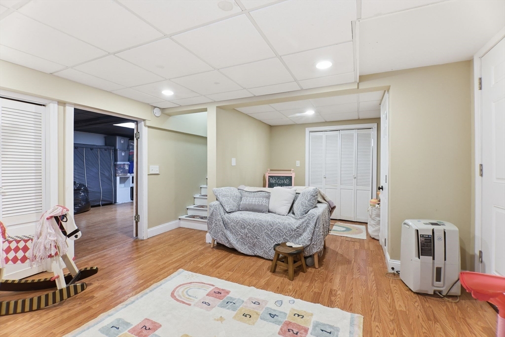141 Lincoln Road Longmeadow, MA 01106 - Photo 18 of 26 a living room with furniture and a wooden floor
