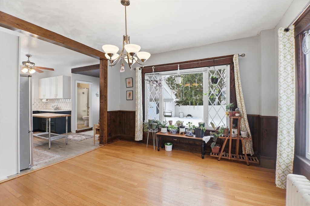 141 Lincoln Road Longmeadow, MA 01106 - Photo 6 of 26 a living room with fireplace furniture and a chandelier