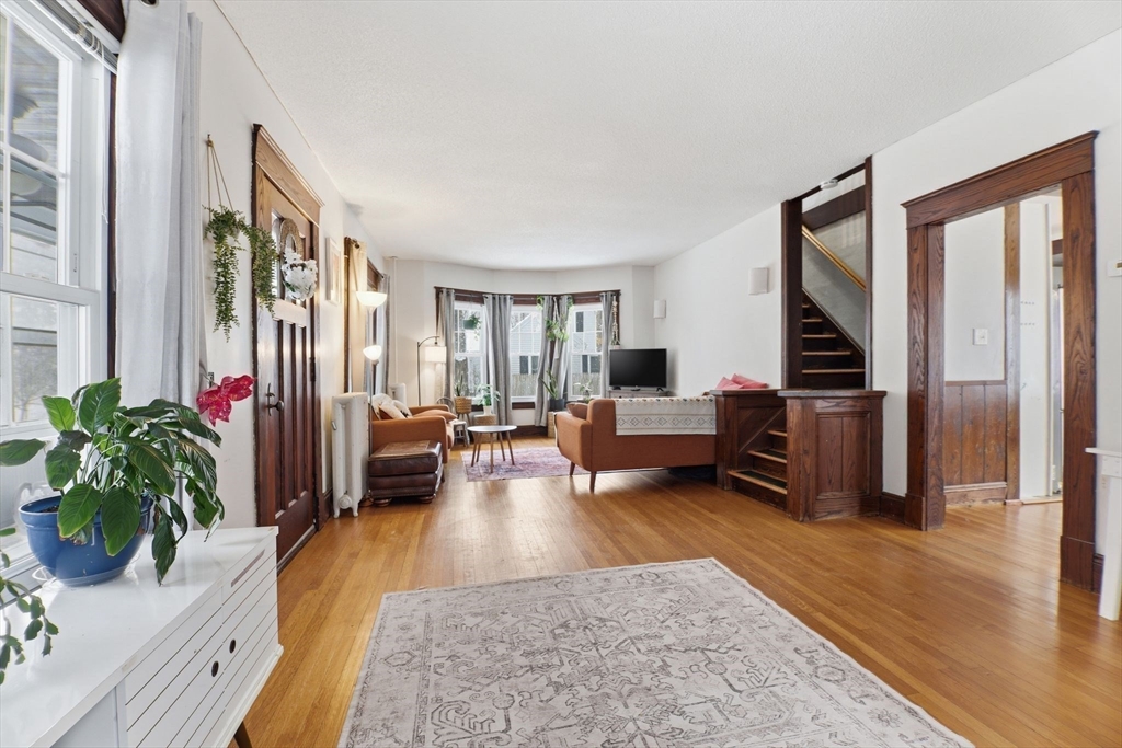 141 Lincoln Road Longmeadow, MA 01106 - Photo 7 of 26 a living room with furniture or couch and a potted plant
