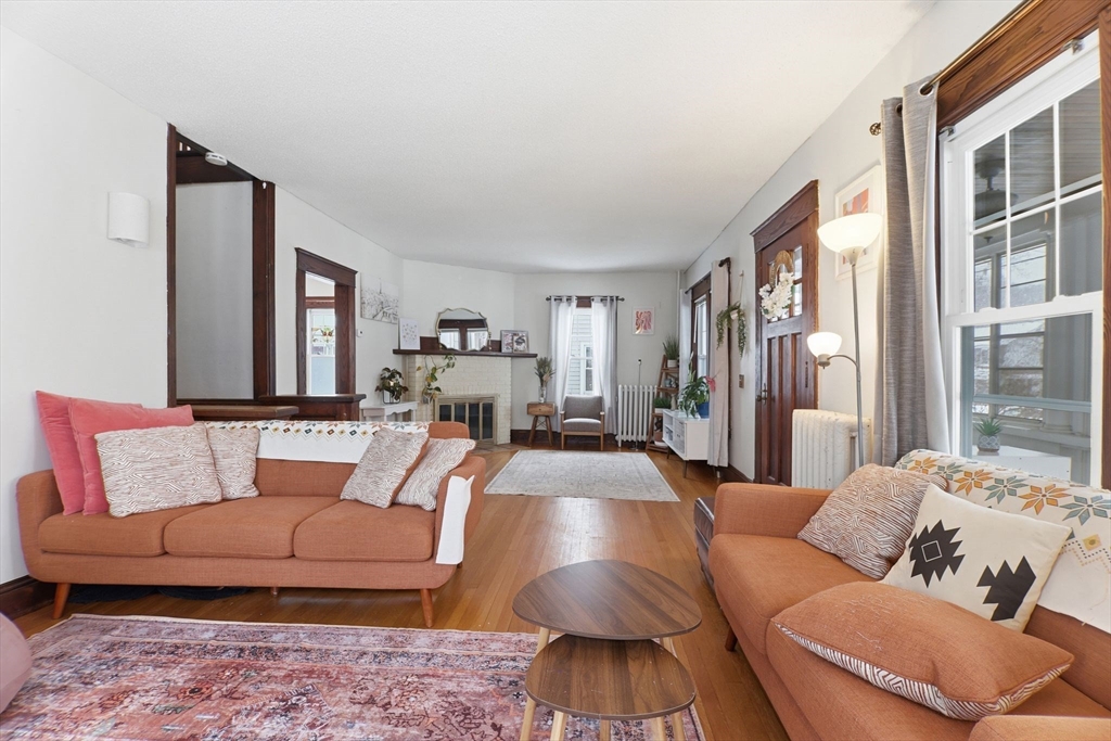 141 Lincoln Road Longmeadow, MA 01106 - Photo 9 of 26 a living room with furniture and a large window