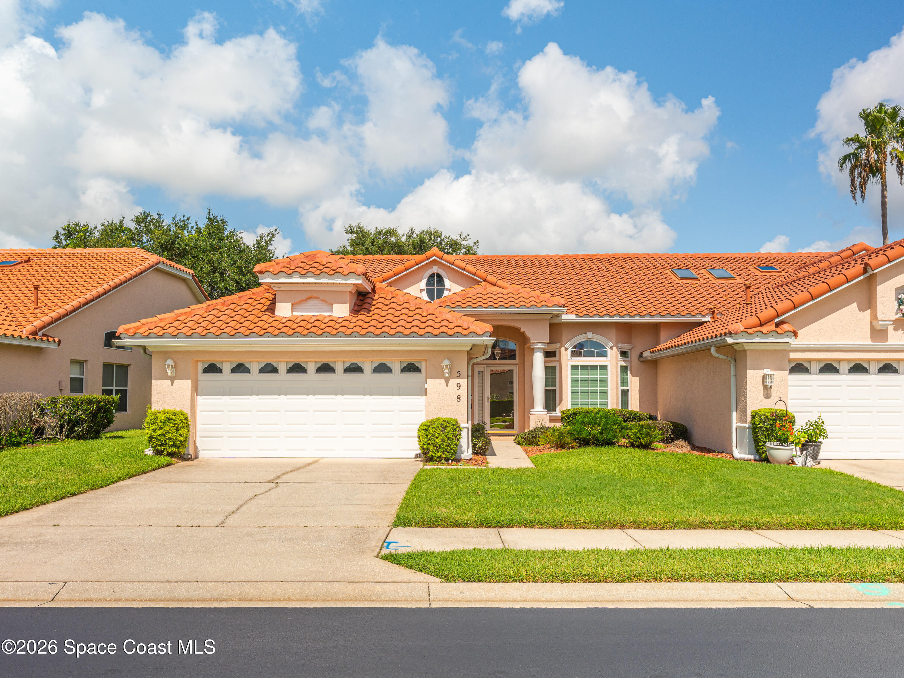 598 Renaissance Avenue Melbourne, FL 32940 - Photo 51 of 56 a view of house with outdoor space and street