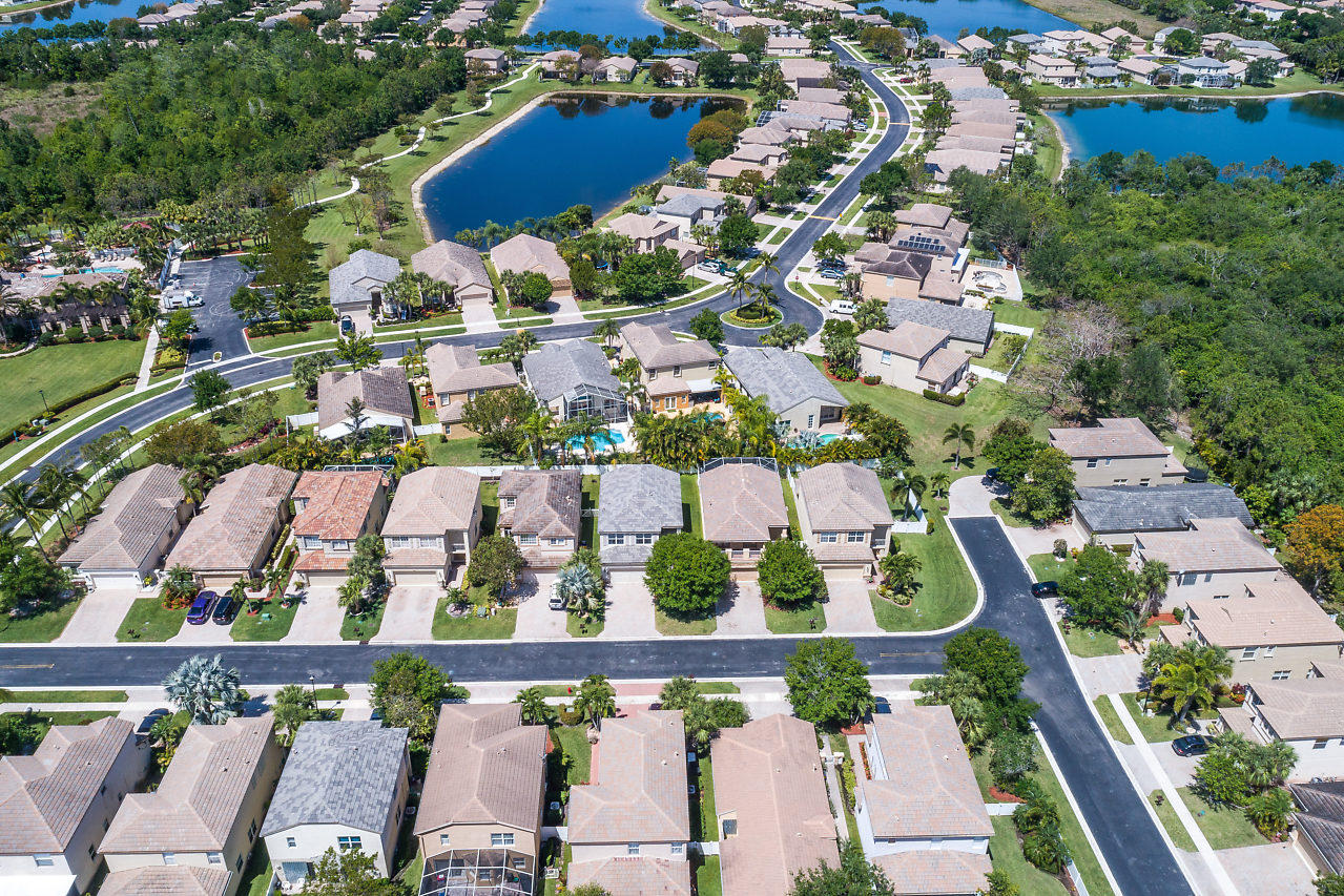 5731 Raceway Road Lake Worth, FL 33449 - Photo 32 of 43 an aerial view of residential houses with outdoor space