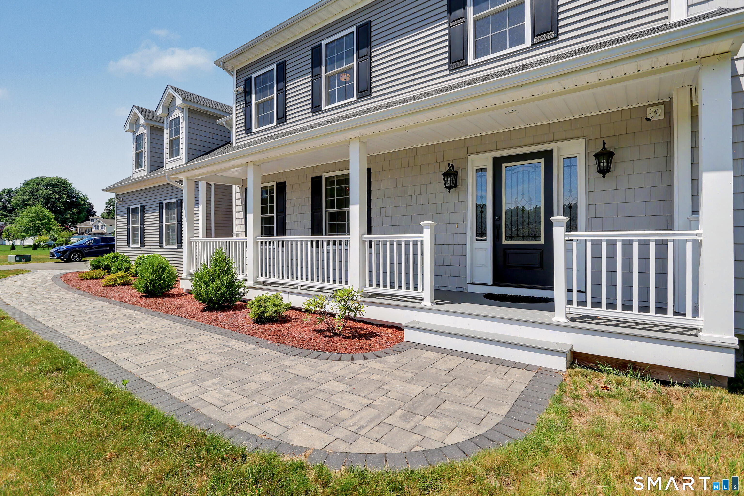 73 Candlewood Road Orange, CT 06477 - Photo 3 of 39 Front porch lined with Trex Decking