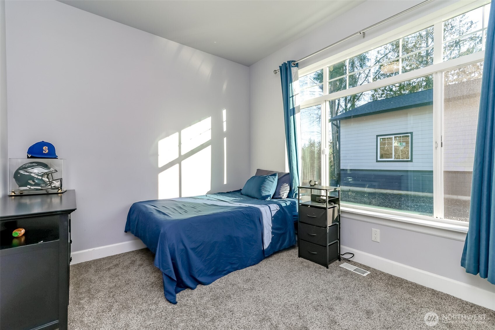 30904 37th Avenue East Graham, WA 98338 - Photo 20 of 40 a bedroom with a bed and a window