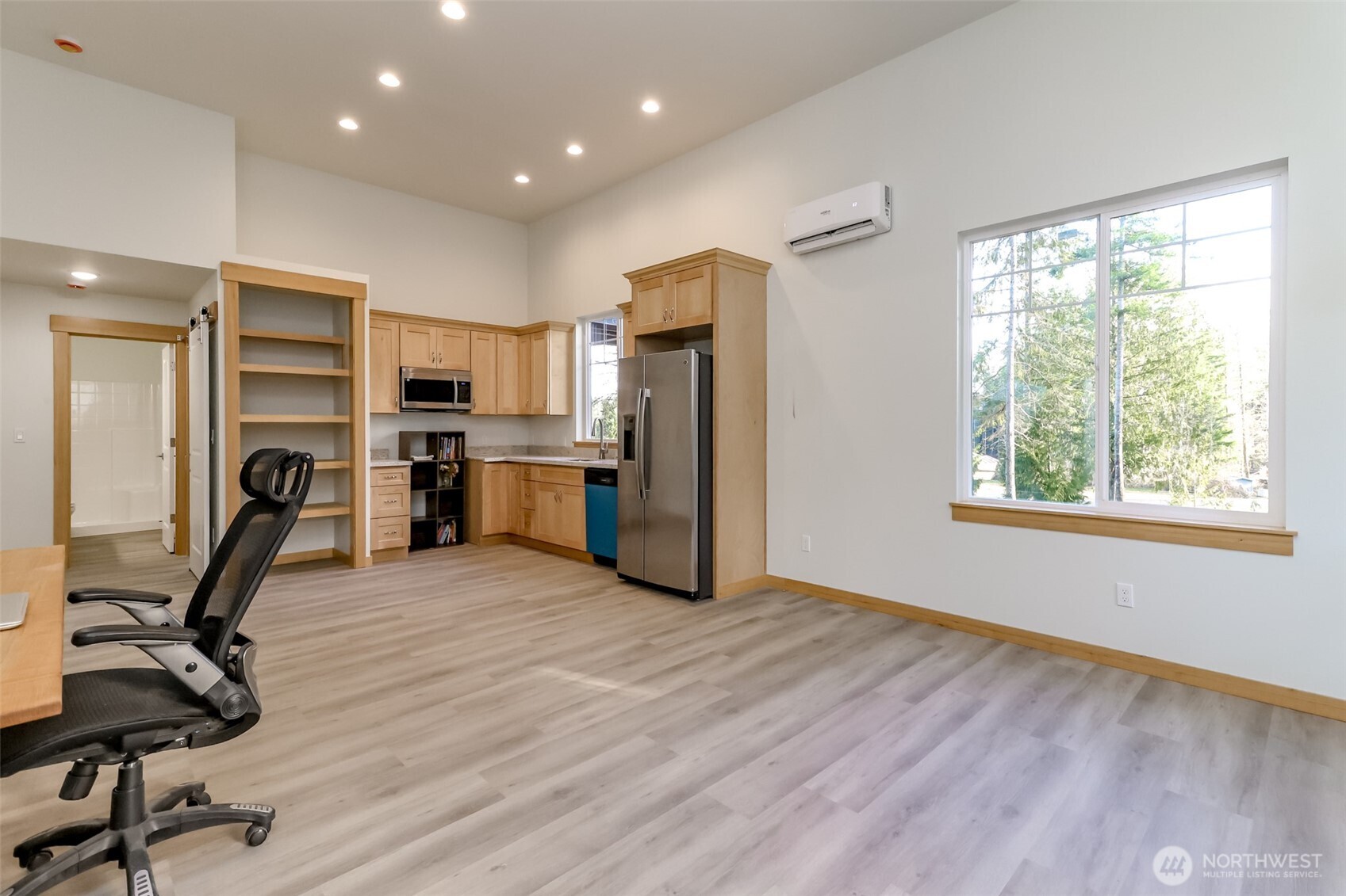 30904 37th Avenue East Graham, WA 98338 - Photo 35 of 40 a view of a kitchen with a sink refrigerator and a window