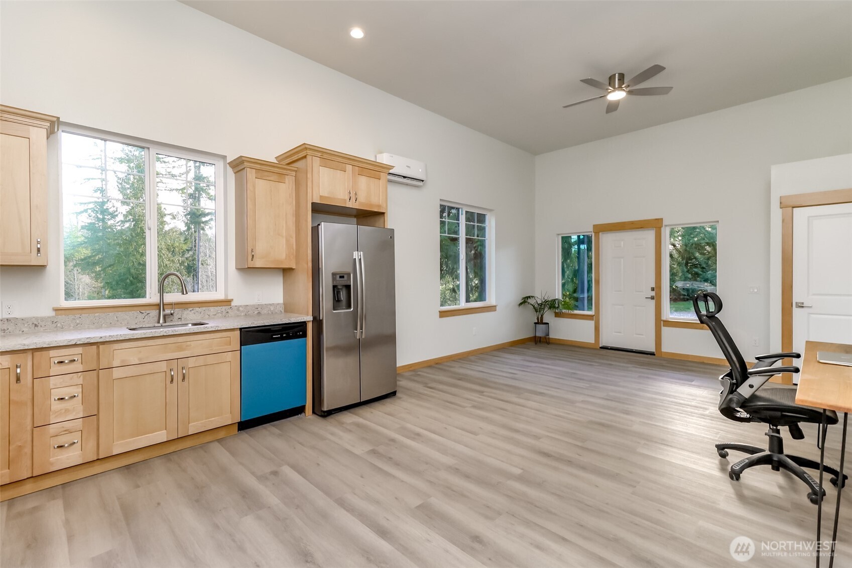 30904 37th Avenue East Graham, WA 98338 - Photo 36 of 40 a view of a kitchen with a sink cabinet and a window