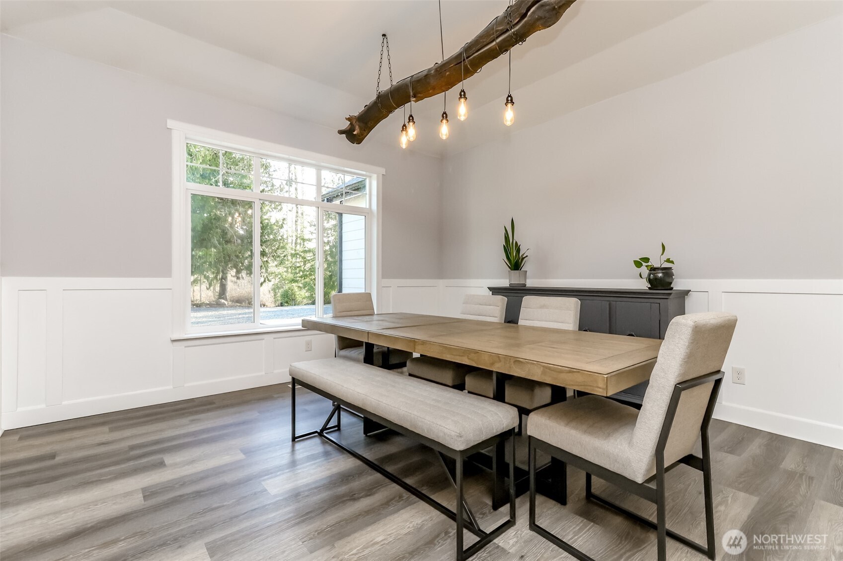 30904 37th Avenue East Graham, WA 98338 - Photo 4 of 40 a view of a dining room with furniture and wooden floor