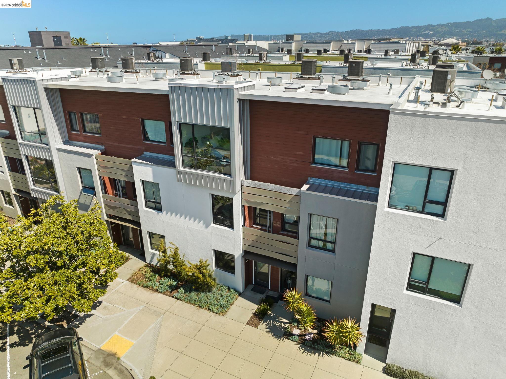 1780 12th Street Oakland, CA 94607 - Photo 24 of 31 a view of a patio with table and chairs