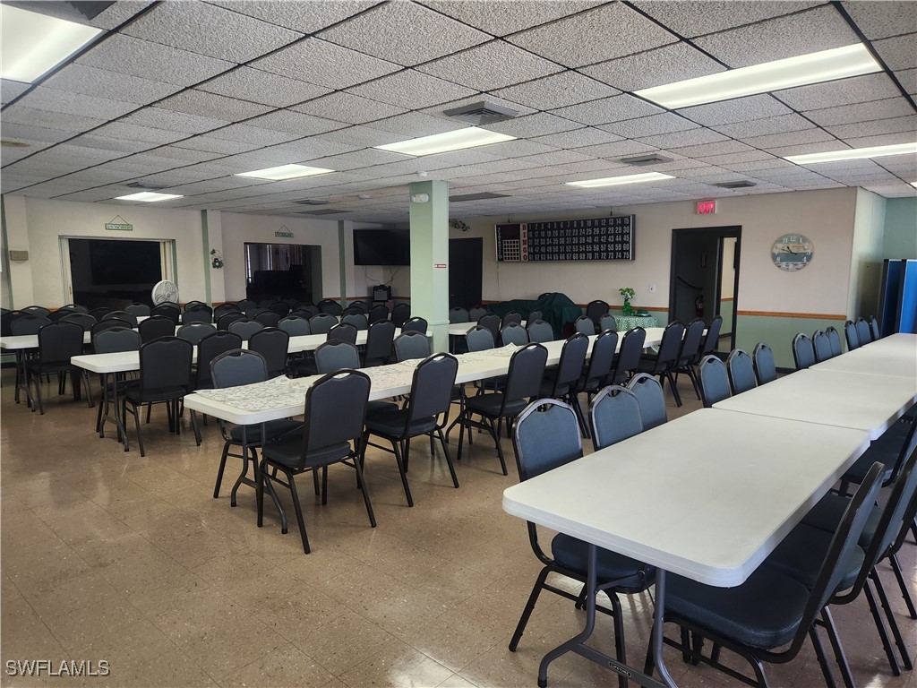 1159 Daniels Road, Unit 74 Moore Haven, FL 33471 - Photo 20 of 37 a view of a dining room with furniture