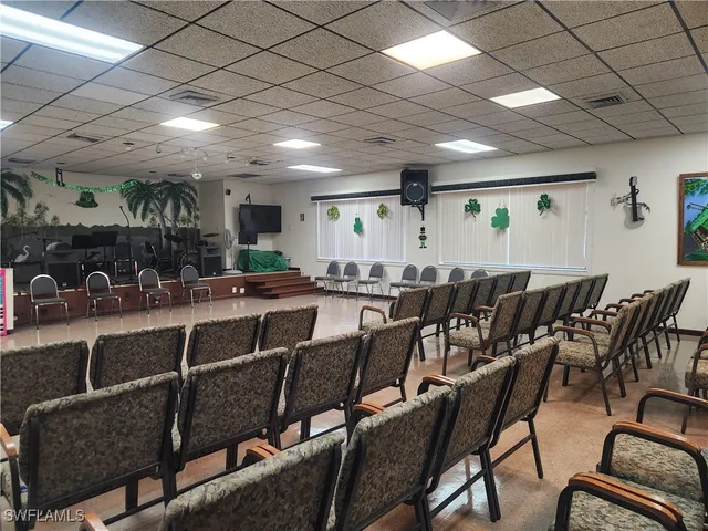 a kitchen with cabinets stainless steel appliances and a sink
