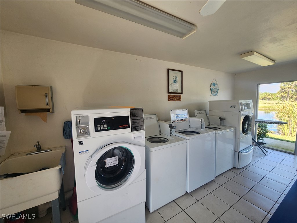 1159 Daniels Road, Unit 74 Moore Haven, FL 33471 - Photo 30 of 37 a view of livingroom with washer and dryer