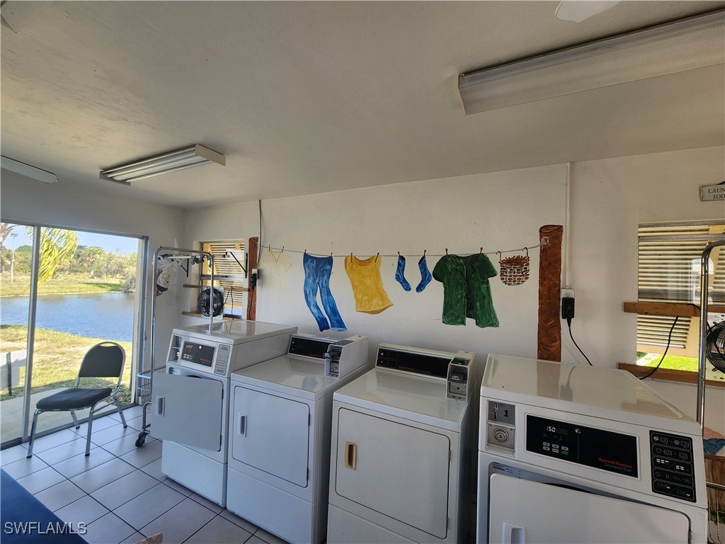 1159 Daniels Road, Unit 74 Moore Haven, FL 33471 - Photo 31 of 37 a room with storage and utility