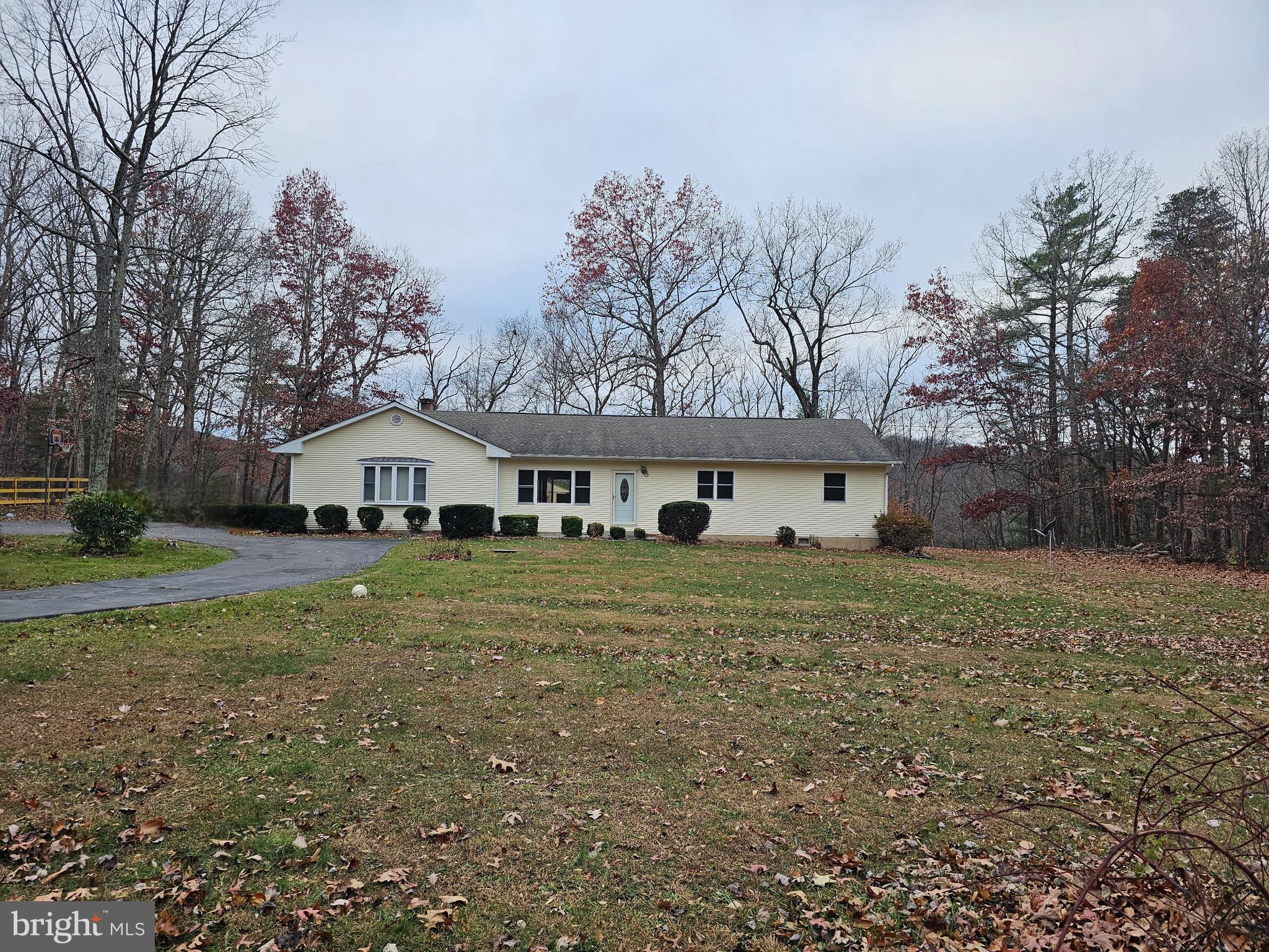 310 Blue Mountain Road Front Royal, VA 22630 - Photo 2 of 24 a front view of a house with a yard
