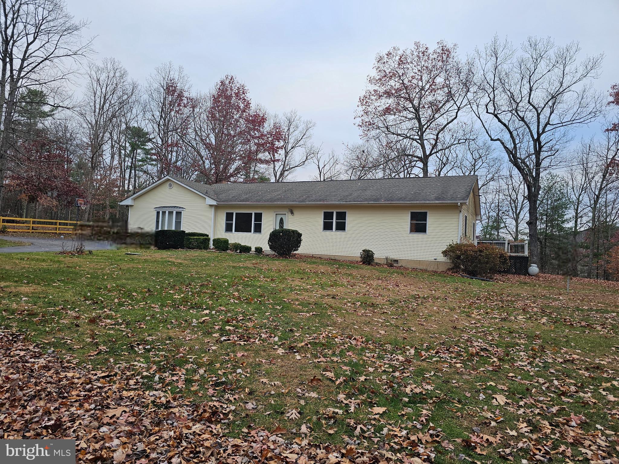 310 Blue Mountain Road Front Royal, VA 22630 - Photo 3 of 24 a view of a house with a backyard